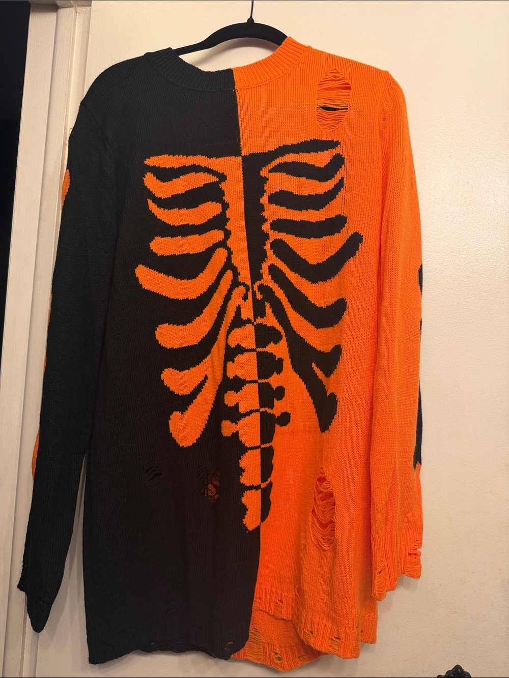 Orange and black skeleton sweater